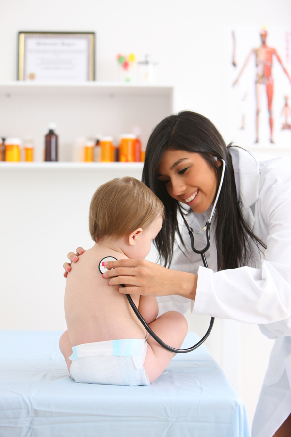 Doctor inspecting a sick child