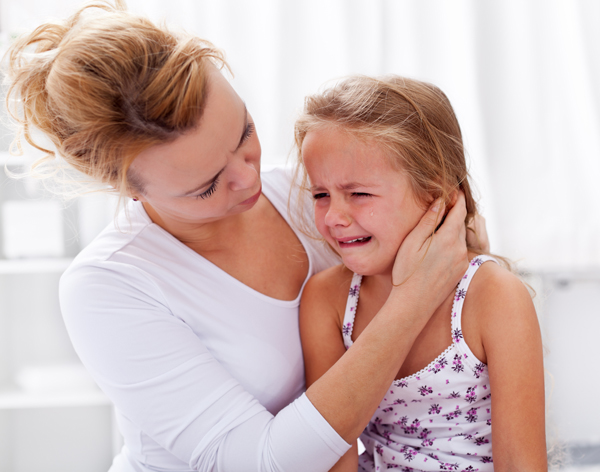 mother looking after her sick child