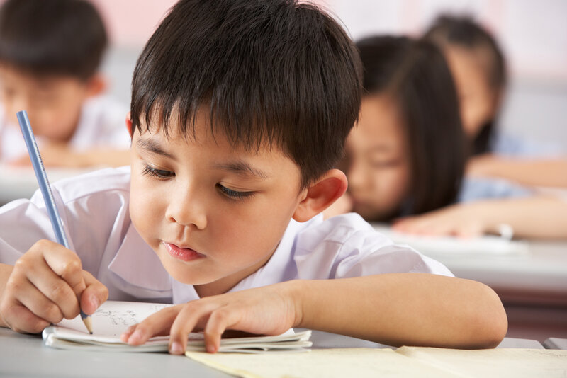 a gifted child working on schoolwork