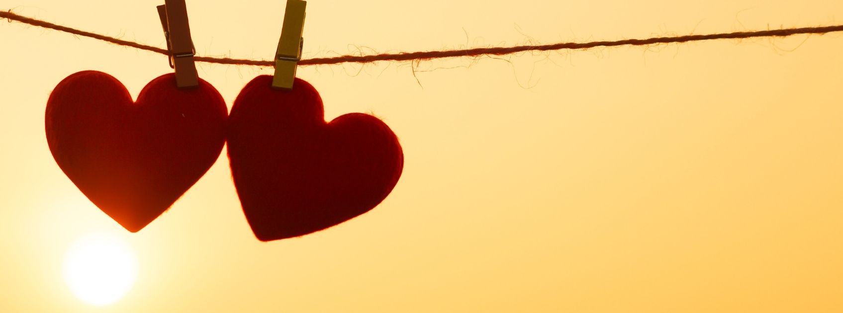 hearts dangling on laundry line