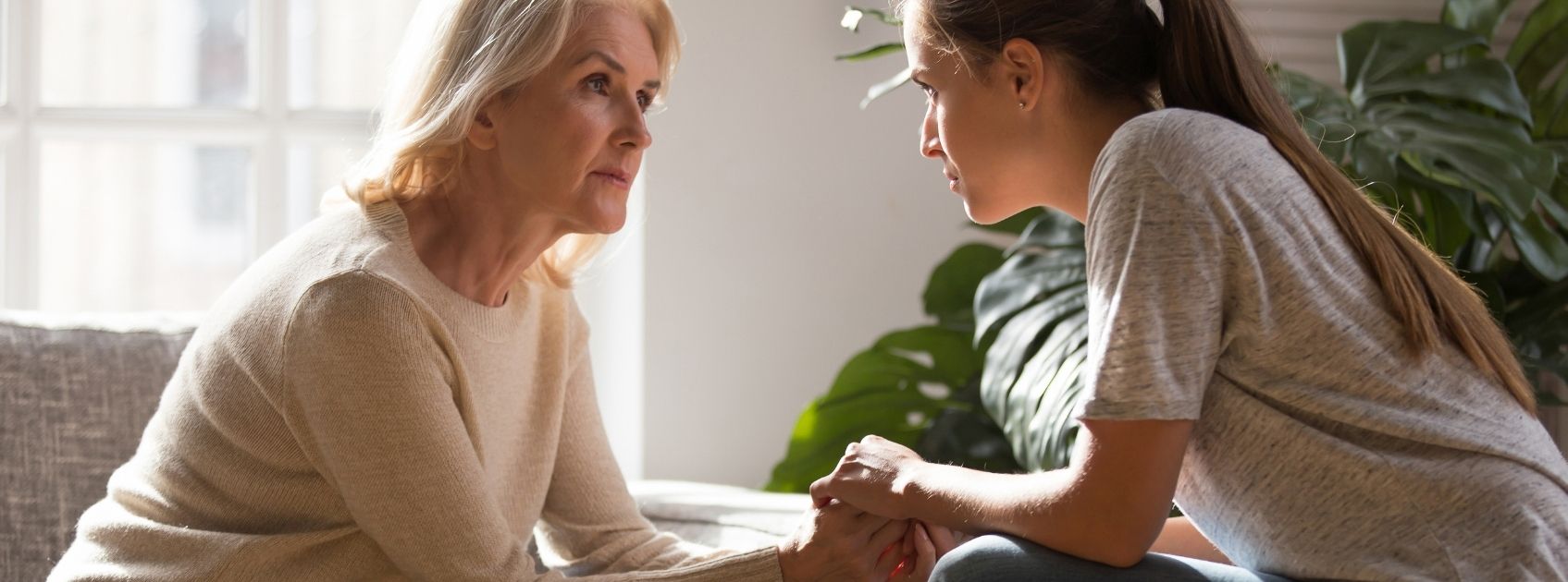 mum talking to daughter