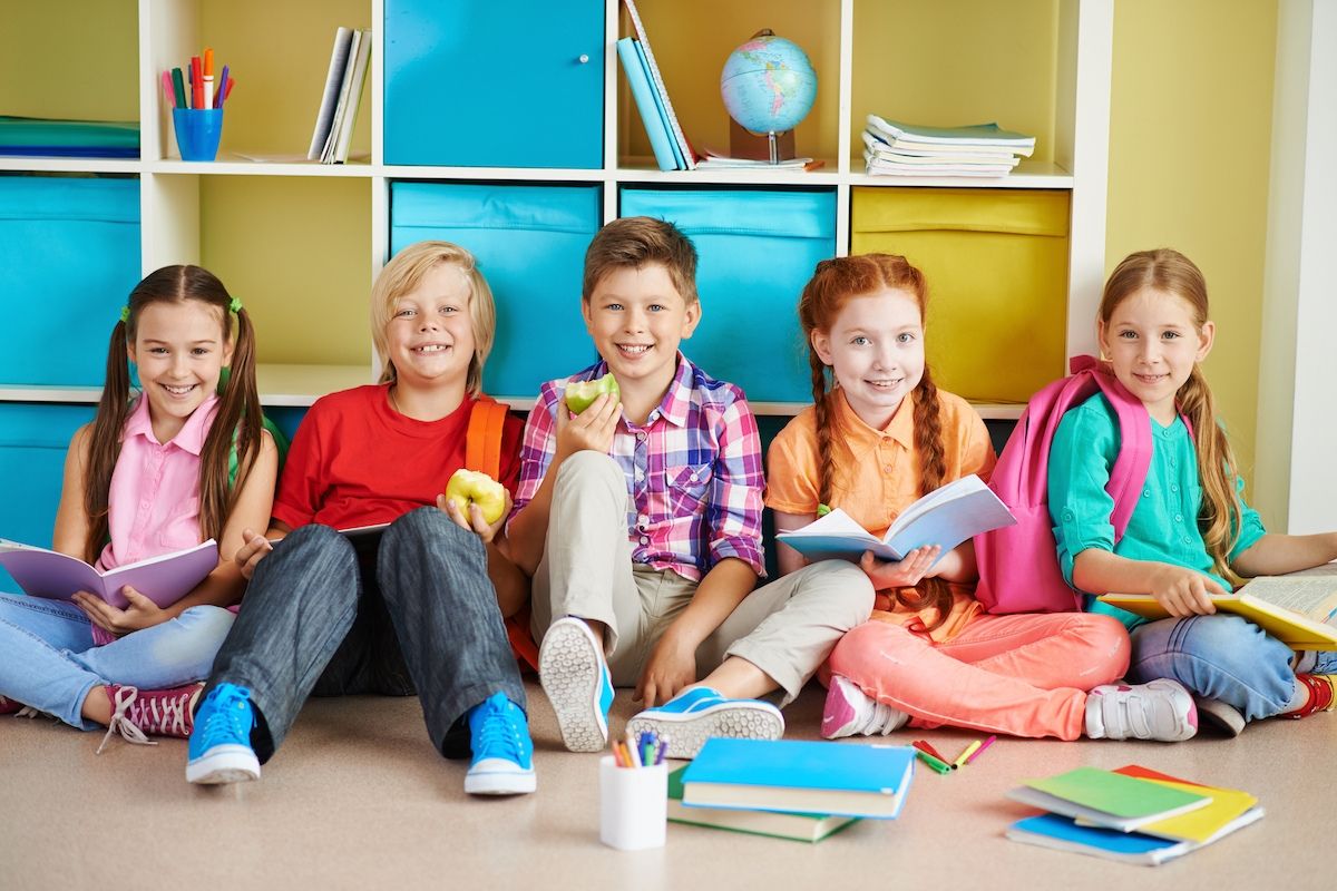 group of kids studying at school