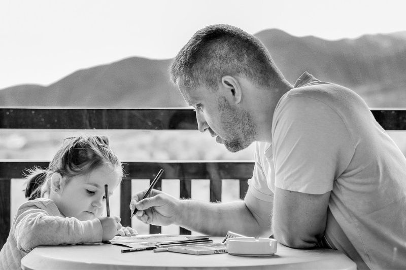 dad and daughter studying
