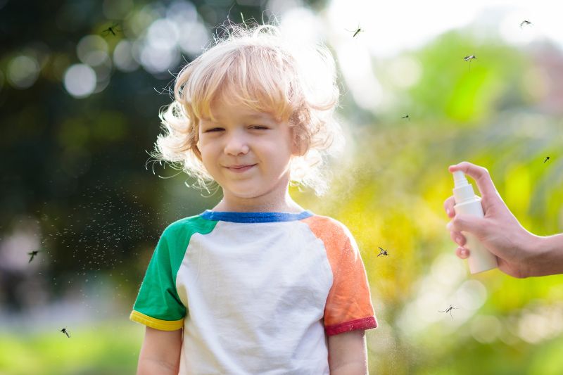 child being bitten by insects