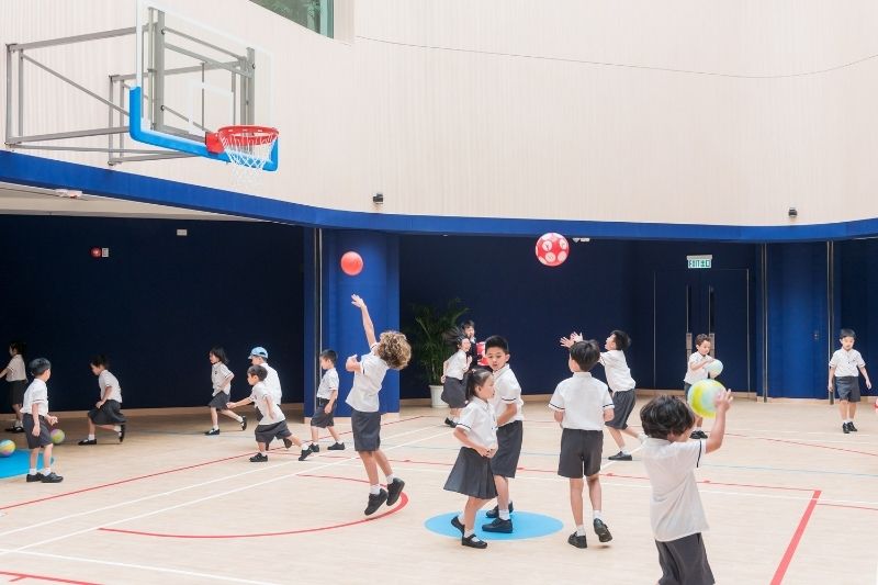 Students playing basketball at Wycombe Abbey School Hong Kong