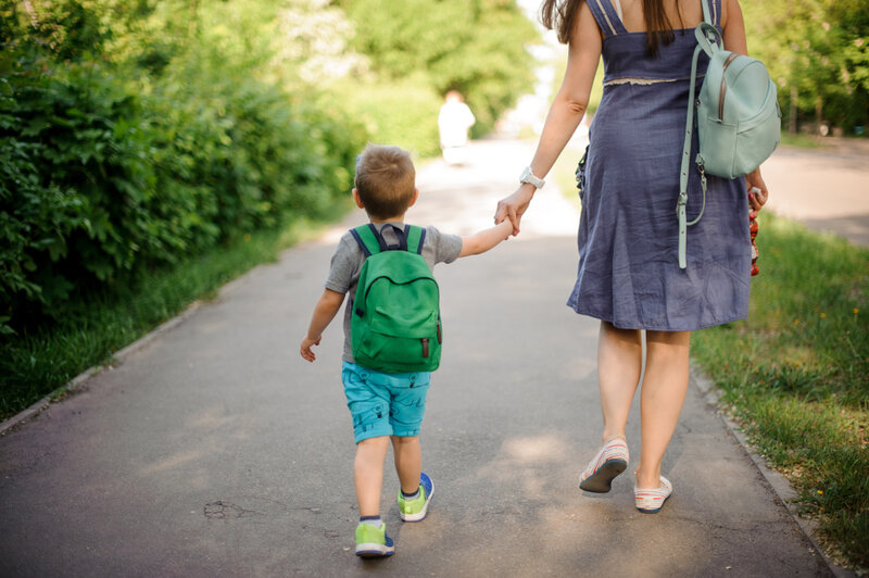 mother walking with child