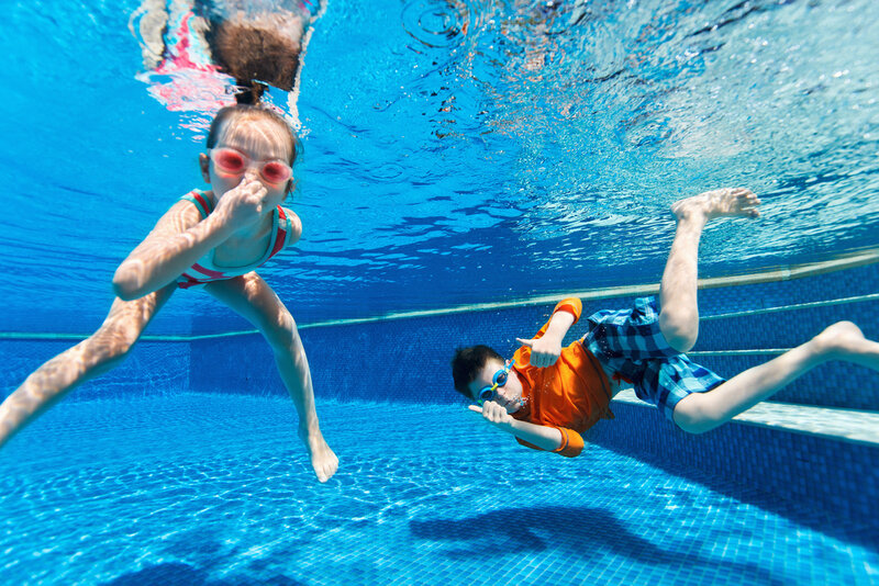 two kids in swimming pool