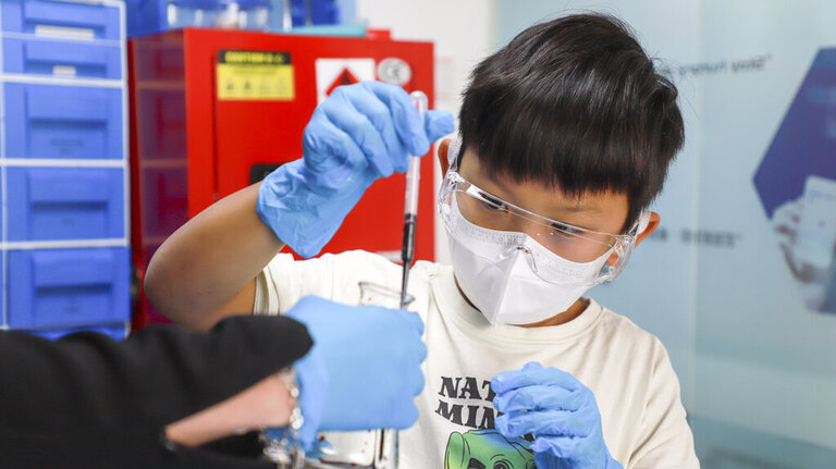 boy taking a class at genius development workshop