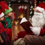 Mysterious,Santa,Claus,Reading,A,Book,With,Children