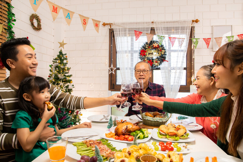 family having a christmas dinner in hong kong
