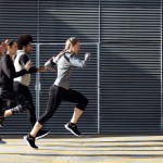 Outdoor,Portrait,Of,Group,Of,Friends,Running,In,The,City.
