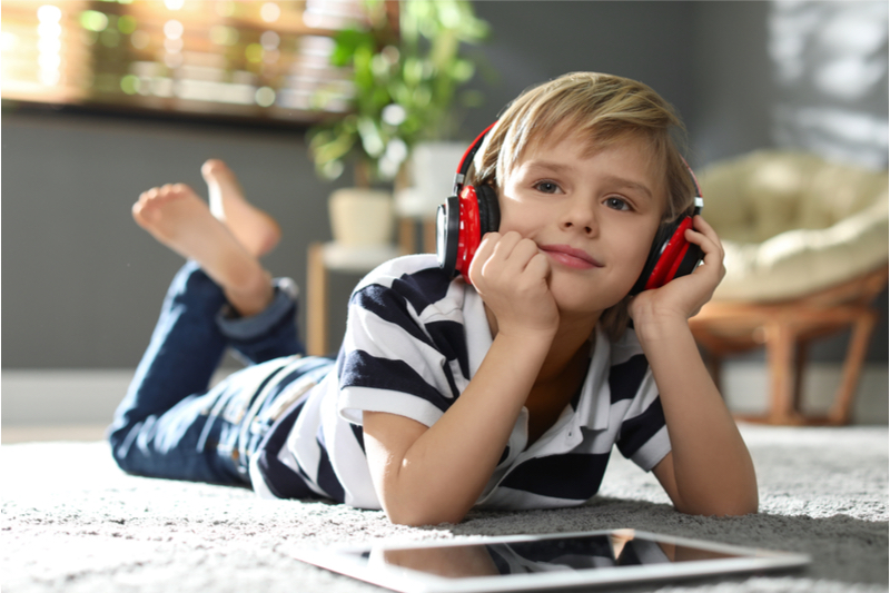 kid listening to podcast